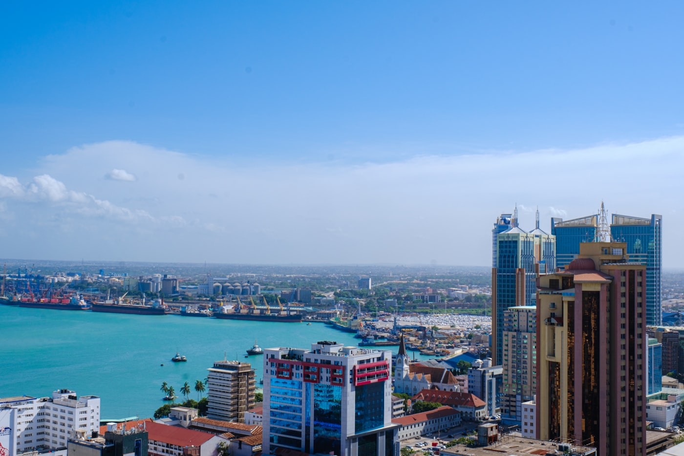 Dar es Salaam harbour skyline with glass towers and cathedral spire